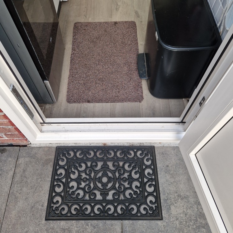 Deurmat en schoonloopmat.